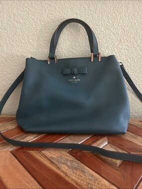 kate spade pebbled leather satchel in teal blue with bow